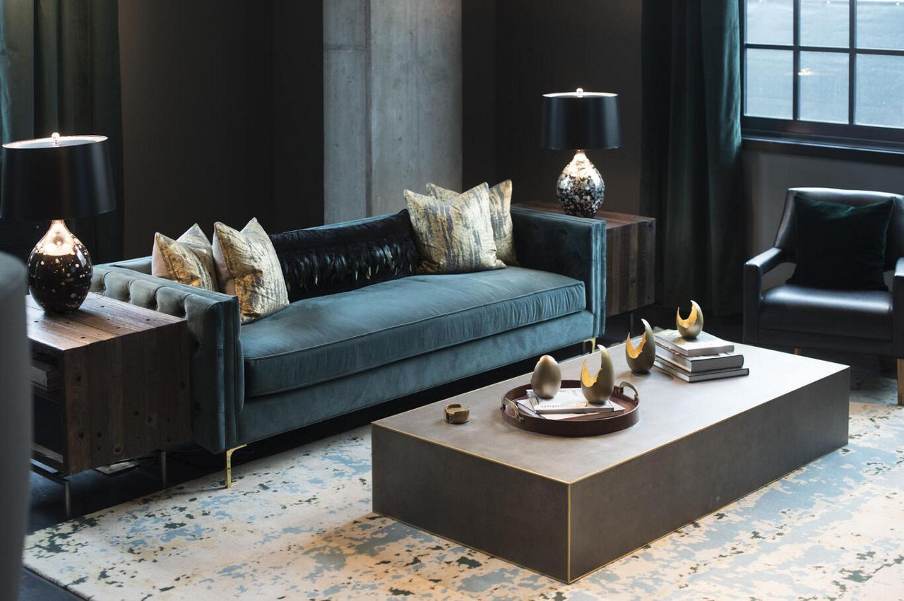 Teal couch in a living room | Blog | Greystar 